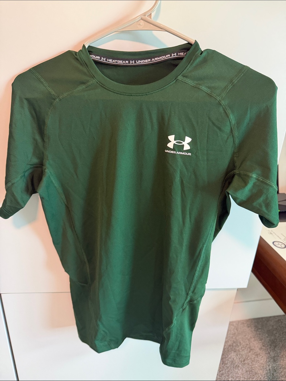 Under Armour Men’s Dark Green HeatGear Short Sleeve Shirt with White Logo